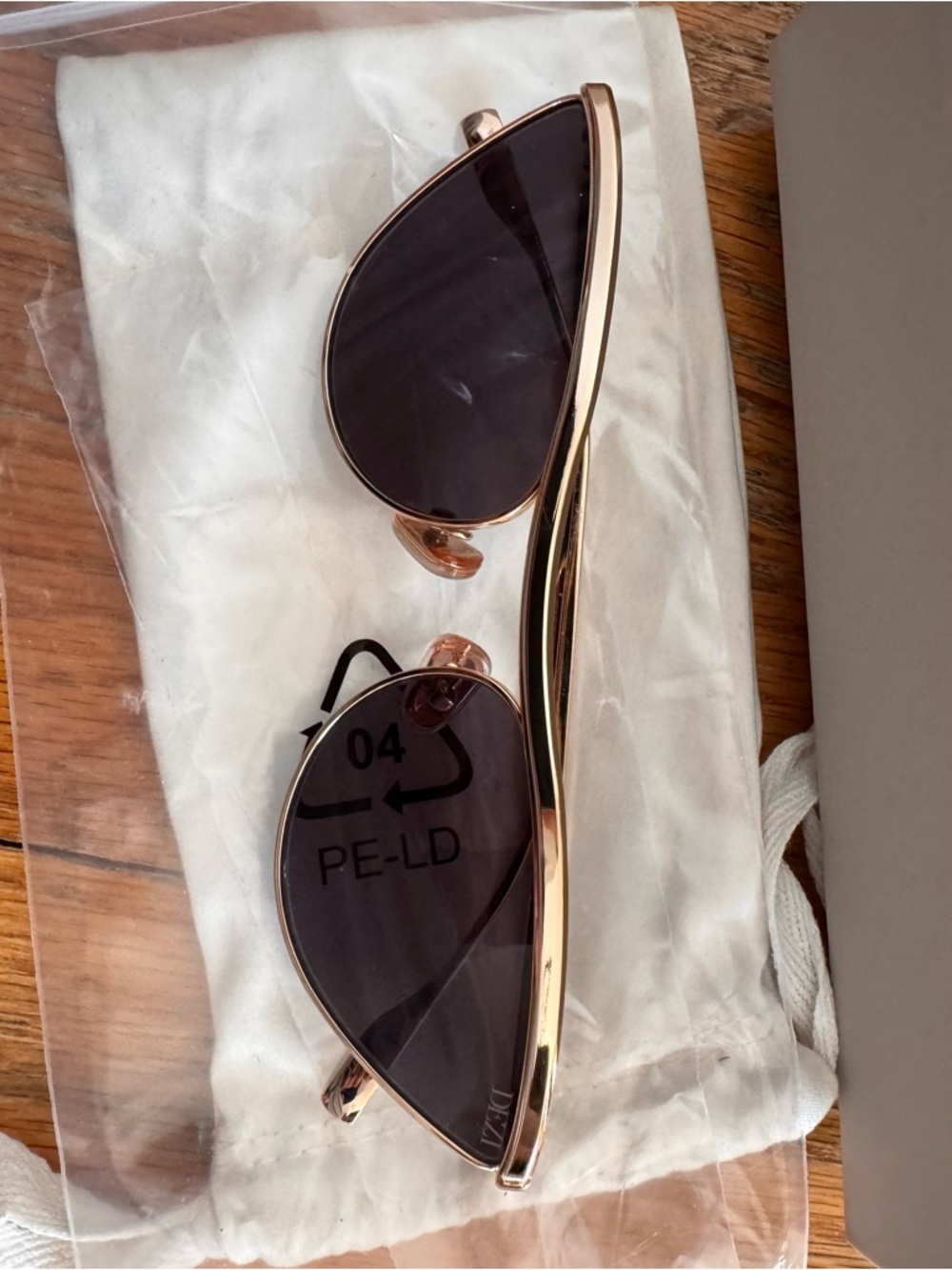 DEZI toxia 
Gold Frame Sunglasses with Dark Smoke Lenses